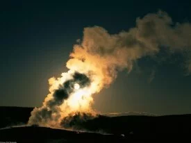 Old Faithful Geyser at Sunset, Yellowstone Natio.jpg