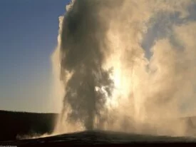 Old Faithful Geyser at Sunset, Yellowstone, Wyom.jpg